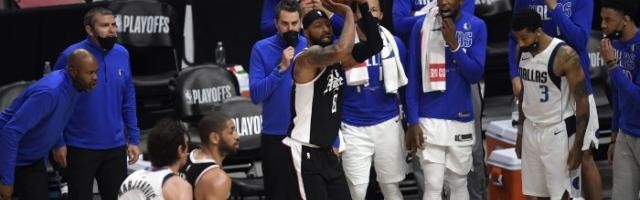 世界杯最新版-重回伤心地为兄弟助威 大莫里斯盼弟弟圆冠军梦