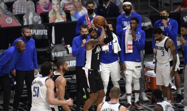 世界杯最新版-重回伤心地为兄弟助威 大莫里斯盼弟弟圆冠军梦